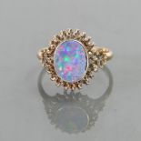 9ct ladies ring set with opal type stone: Size L, 2.5 grams.