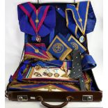 A collection of Masonic Regalia: Including badges, medals, gowns, ties, drapes etc.