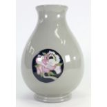 Moorcroft vase decorated with panels of Roses: Height 20cm
