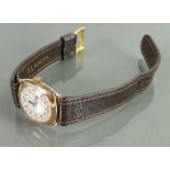 9ct gold vintage EKB gentlemans wristwatch: With leather strap.