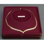 9ct gold shaped ladies necklace: 9.9 grams.
