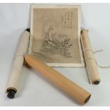 A collection of Chinese Silk on Paper Scrolls with similar soft bound similar book.