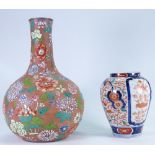 Japanese 19th century Imari porcelain vase and a terracotta vase decorated with enamelled flower