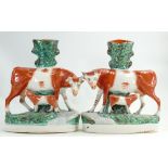 Pair of 19th Century Staffordshire Pottery spill vases: In the form of Hereford cow & calf (neck to