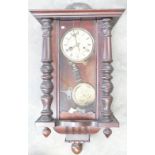 Early 20th century Spring Driven Wall Clock: Height 107cm,