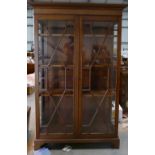 Edwardian Mahogany tall Bookcase: With Astragal glazed doors. (Missing bottom left glass panel).