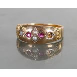 Antique 15ct gold ring set with rubies and seed pearls: Size N, 3.1 grams (one seed pearl missing).