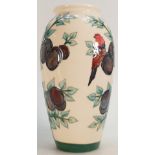 Moorcroft vase decorated in the Bird & Plum tree design by Sally Tuffin: Height 25.5cm.