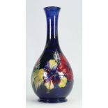 Walter Moorcroft vase decorated in the Hibiscus design: Height 26cm, c1950s.