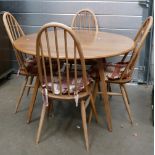 Ercol mid century light coloured table and chairs: Some sun fading to legs.