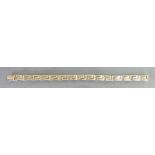 Yellow coloured metal bracelet: Which tests for 9ct gold or better,16.3 grams.