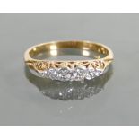 18ct gold ladies five stone diamond ring: Size N, 2.6 grams.