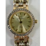 9ct gold ladies Jean Lapaix quartz wristwatch with 9ct gold bracelet: Overall weight 27.8 grams.