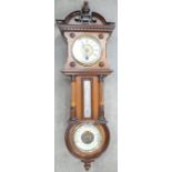 Early 20th century Walnut Barometer clock: Height 67cm,