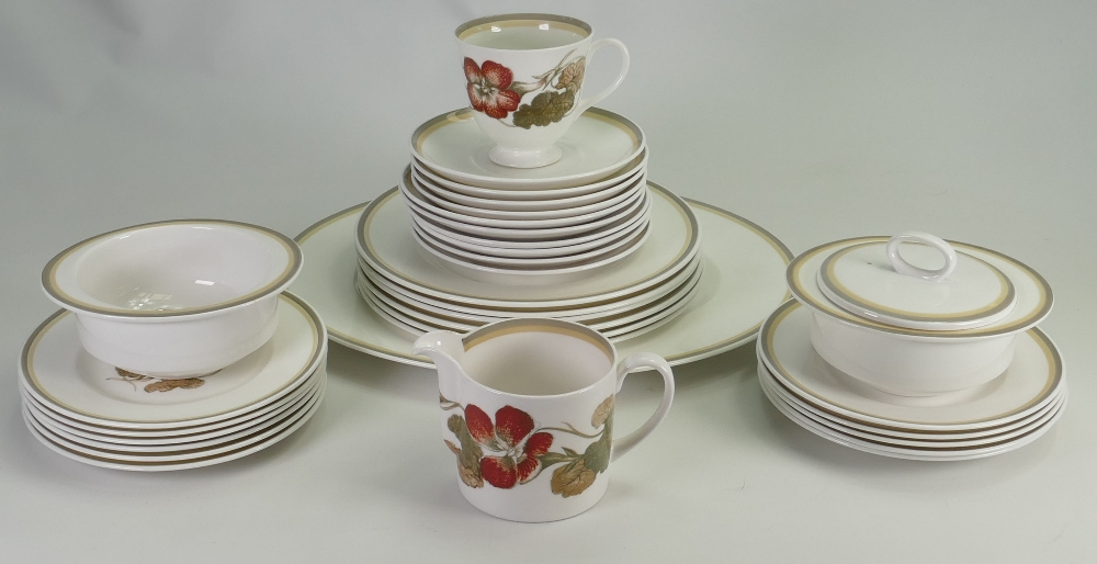 A collection of Susie Cooper for Wedgwood Nasturtium patterned tea and dinner ware: To include