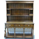 Reproduction Titchmarsh & Goodwin Oak three drawer dresser: Pot board upper section, height 179cm,