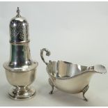 A collection of silver items to include: Silver sifter and sauce boat, 253 grams.