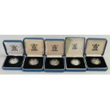 Five silver proof £1 coins: 1986, 1990, 1991,1993 and 1996. All proof silver coins with box and COA.
