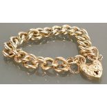 9ct gold bracelet with heart locket: 38.4 grams.