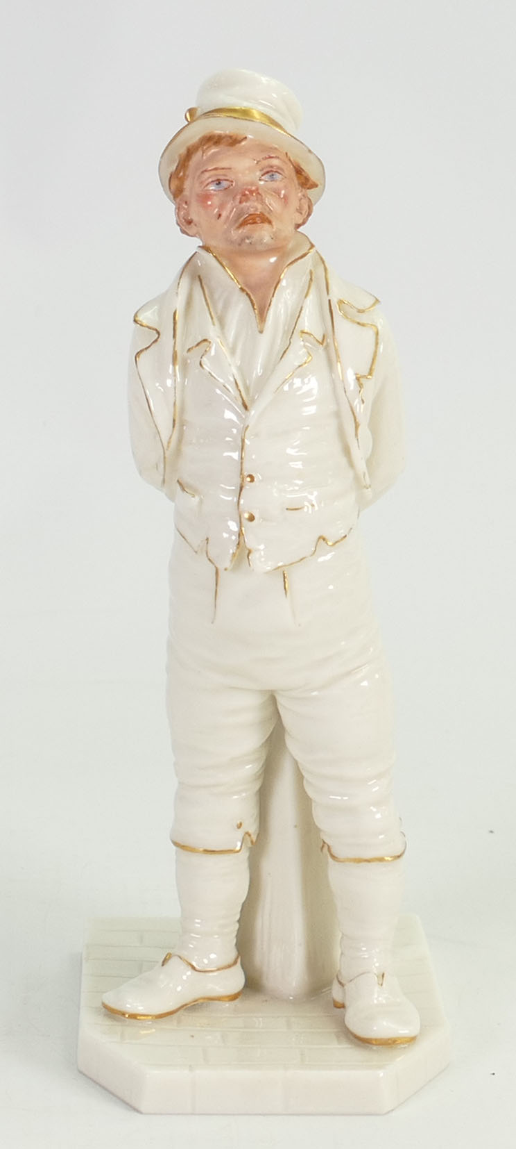 Royal Worcester figure of a Dickensian man: in white and gold colours, height 18cm.