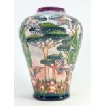 Moorcroft vase decorated with Exotic trees and birds: Designed by Philip Gibson,