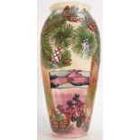 Moorcroft vase decorated in the Furzy Hill design dated 1997: Height 36cm.