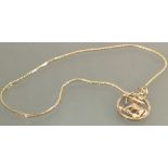 9ct yellow gold Sagittarius pendant & 9ct necklace: 7.3 grams.