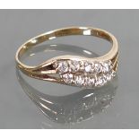 9ct gold ring set with ten diamonds: Size P/Q,1.6 grams.