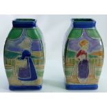 Royal Doulton Lambeth pair of small vases: Decorated with Dutch boy & girl in landscape scenes