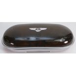 Bentley specially made Sunglasses case: Made from aluminium and burr elm coated wood.