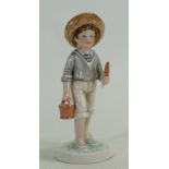 Royal Doulton prototype figure of a boy with a bucket & spade: Height 13cm.