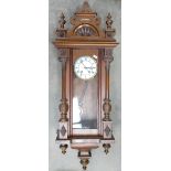 Early 20th century Walnut Spring Driven Wall clock: Height 109cm,