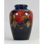 William Moorcroft vase decorated in the Pomegranate design: Height 16cm, c1930s.