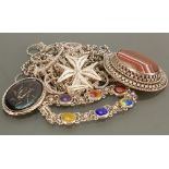 A collection of ladies silver jewellery: Including stone set pendants, brooches,
