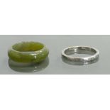 Platinum wedding band 3.2 grams and jade wedding band.