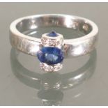 18ct white gold diamond and sapphire ring: Size O/P, 4.8 grams.