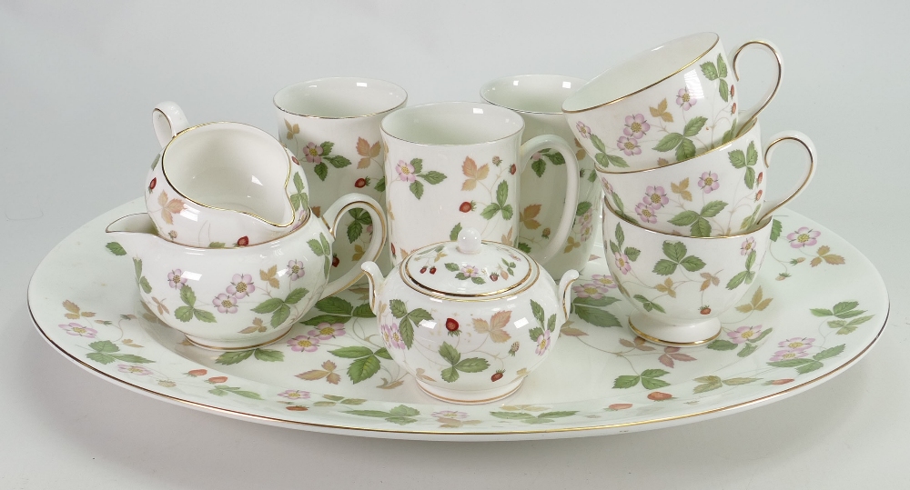 Wedgwood tea set in the Wild Strawberry design: Including cups, saucers, mugs, large oval platter,