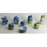 A collection of Shelley Harmony drip ware: To include a small tulip shaped teapot, cream jug,