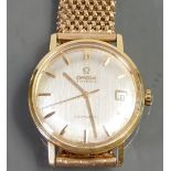 Omega Seamaster 18ct gold gentlemans automatic wristwatch: With 9ct gold bracelet. Gross weight 65.