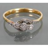 Ladies yellow metal diamond ring: Set with 3 stones, tested to be 18ct, 3.8 grams.
