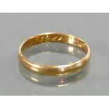 Yellow metal wedding band tested to 18ct or higher: Inscribed date inside 1865, 2.2 grams.