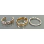 Silver bangles and 9ct gold core bracelet: Silver weight 71 grams.
