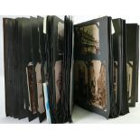 Early 20th century Postcard collection: Leather album containing many vintage postcards (approx 250