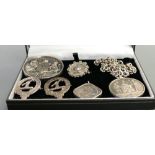 A collection of silver items: Including labour medal and chain,