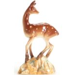 Beswick early Fawn on base 696: In natural colours.