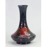 William Moorcroft vase decorated in the Pomegranate design: Height 16cm, c1930s.