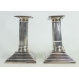 Pair of Corinthian column silver candlesticks London 1893: Unloaded bases, and weighing 371.7g.