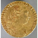 Full Guinea gold coin 1785: Condition VF light flecking.