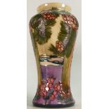 Moorcroft vase decorated in the Furzy Hill design dated 1997: Height 27cm.