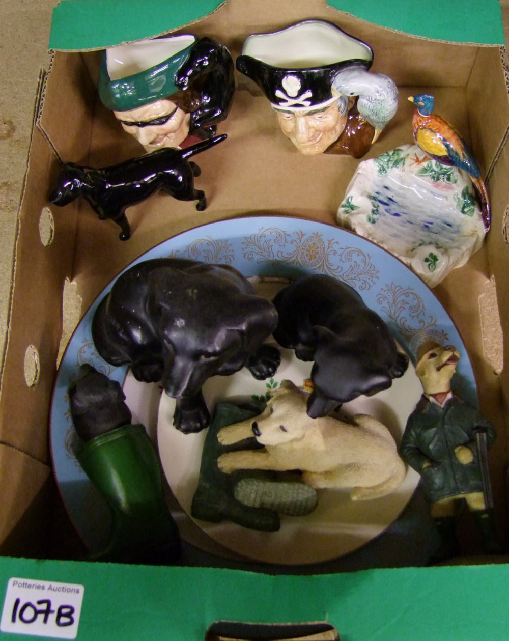 A mixed collection of items including: Beswick pheasant ashtray, Beswick small black labrador, Royal